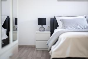 Postel nebo postele na pokoji v ubytování Vila Marina
