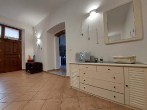 Kuchyň nebo kuchyňský kout v ubytování B&B Cala Seggiola