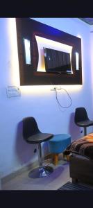 TV a/nebo společenská místnost v ubytování Hotel Starlight + 27 fotografií