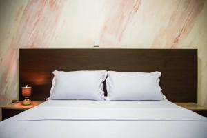 Ένα ή περισσότερα κρεβάτια σε δωμάτιο στο Villa SMK