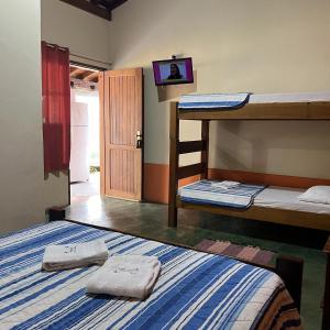 Двох'ярусне ліжко або двоярусні ліжка в номері Pousada Recanto Janbor