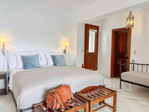 Posteľ alebo postele v izbe v ubytovaní Ourania's Mansion