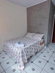 Een bed of bedden in een kamer bij Pousada Sempre Viva Lençóis