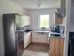 Kuchyň nebo kuchyňský kout v ubytování Ferienwohnung Sandra