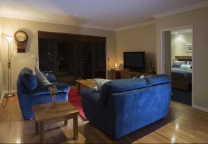 
A seating area at Murray River Lodge Luxury Boutique Accommodation B&B - Adults only
