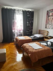 Postel nebo postele na pokoji v ubytování Split Downtown