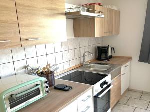 Køkken eller tekøkken på Apartment in Elbingerode near Waterfall