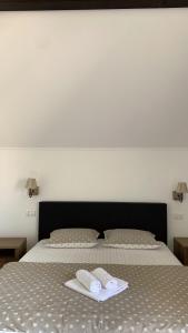 Postel nebo postele na pokoji v ubytování Casa Paunescu