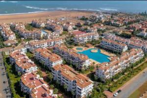 an aerial view of a resort near the beach at Complex garden beach2 sidi rahal in Sidi Rahal