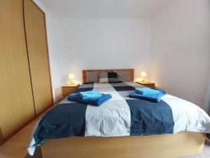 En eller flere senge i et værelse på Azores Physis Apartment - sea view