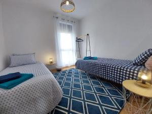 En eller flere senge i et værelse på Azores Physis Apartment - sea view + 34 billeder