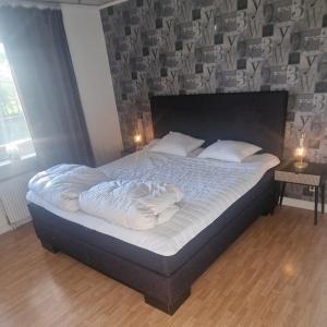 Postel nebo postele na pokoji v ubytování Villa Skoghem