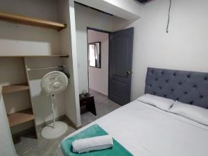 Llit o llits en una habitació de Apartaestudio Mali's House
