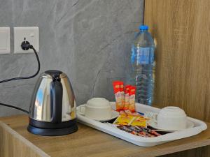 Příslušenství pro přípravu čaje a kávy v ubytování Cuzy bubbel luxury