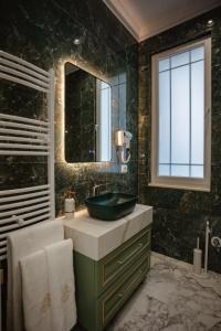 Koupelna v ubytování Ervini Boutique Hotel