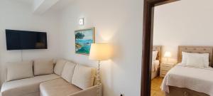 Posteľ alebo postele v izbe v ubytovaní Villa Queen