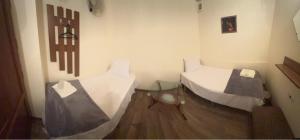 Ліжко або ліжка в номері ENIGMA HOSTEL