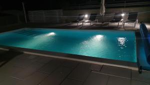Bazén v ubytování Apartmani Naomi&Leo nebo v jeho okolí