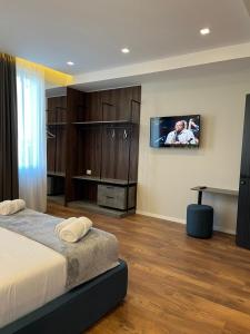 Postel nebo postele na pokoji v ubytování North Alb Hotel