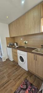 Kuchyň nebo kuchyňský kout v ubytování Apartman Lookman Neum