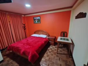 Ένα ή περισσότερα κρεβάτια σε δωμάτιο στο Yati Hostal