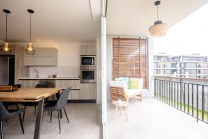 Kuchyň nebo kuchyňský kout v ubytování Blue Venao CONDO APARTMENT C21 + 37 fotografií