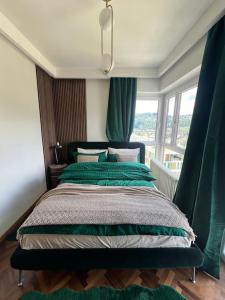 Postel nebo postele na pokoji v ubytování Panorama Suite in Lugano - Pazzallo