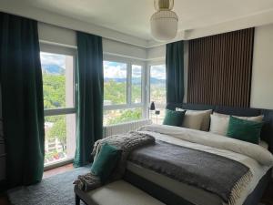 Postel nebo postele na pokoji v ubytování Panorama Suite in Lugano - Pazzallo
