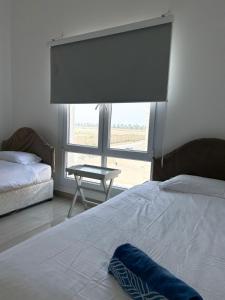 Voodi või voodid majutusasutuse VILLA seeb 2 MIN walk to the beach toas