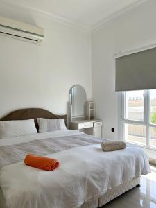 Voodi või voodid majutusasutuse VILLA seeb 2 MIN walk to the beach toas
