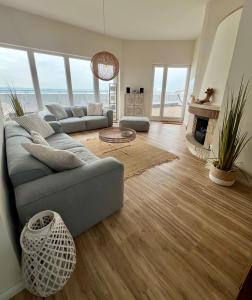 Posezení v ubytování COAST HOUSE Sky Suite