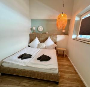 Postel nebo postele na pokoji v ubytování COAST HOUSE Sky Suite