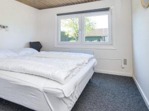 Postel nebo postele na pokoji v ubytování Holiday home Tarm LXXIX