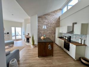 Küche/Küchenzeile in der Unterkunft COAST HOUSE Sky Suite
