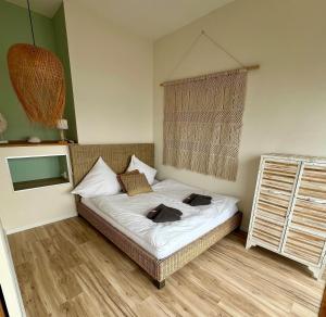Ein Bett oder Betten in einem Zimmer der Unterkunft COAST HOUSE Sky Suite