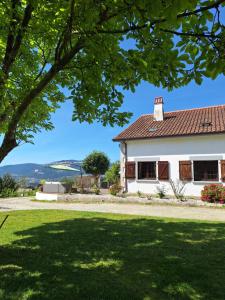 a white house with a red roof at LIMA COTTAGES - Casa de S Tiago in Ponte de Lima