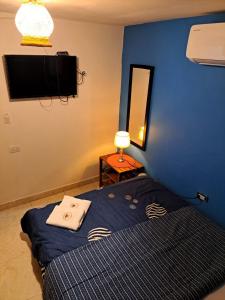 Postel nebo postele na pokoji v ubytování Hostel Shalom Adonai