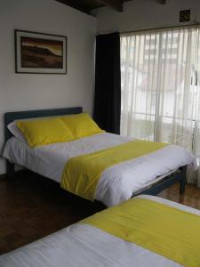 Letto o letti in una camera di Hotel Rincón Escandinavo