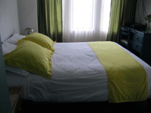 Letto o letti in una camera di Hotel Rincón Escandinavo