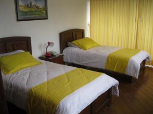 Letto o letti in una camera di Hotel Rincón Escandinavo