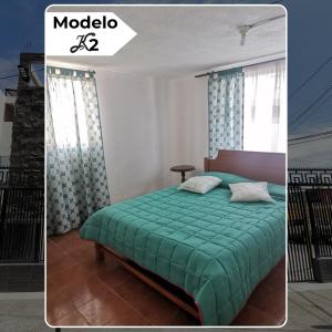 Ένα ή περισσότερα κρεβάτια σε δωμάτιο στο Apart-Hotel Katari