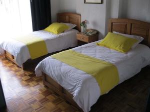 Letto o letti in una camera di Hotel Rincón Escandinavo