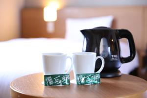 Příslušenství pro přípravu čaje a kávy v ubytování Dormy Inn Chiba City Soga