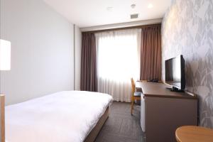 TV a/nebo společenská místnost v ubytování Dormy Inn Chiba City Soga
