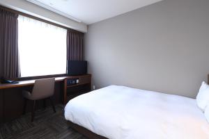 TV a/nebo společenská místnost v ubytování Dormy Inn Chiba City Soga