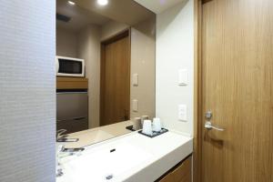 Koupelna v ubytování Dormy Inn Chiba City Soga