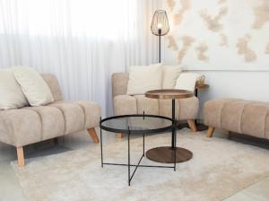 Posezení v ubytování NYA Boutique Suite