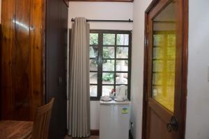 Kuchyň nebo kuchyňský kout v ubytování Hotel Chateau St Cloud