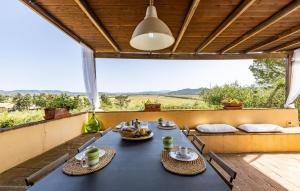 a blue table with chairs on a patio at Casa Bellavista in Casa Lappi