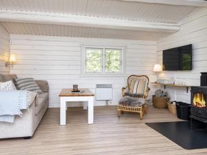TV a/nebo společenská místnost v ubytování Holiday home Fanø LII